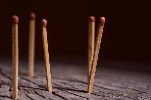 wooden matches are on the wooden frame. Concept photo. High quality photo