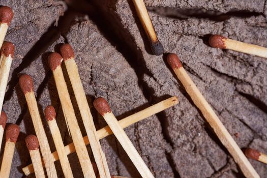 wooden matches lie on the wooden frame. High quality photo