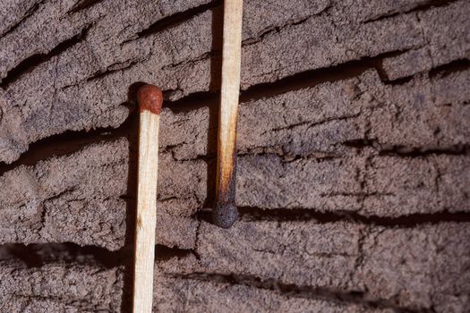 wooden matches lie on the wooden frame. High quality photo