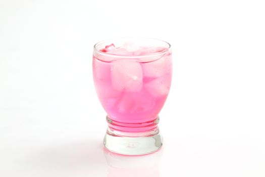 Glass of pink lemonade isolated in white background