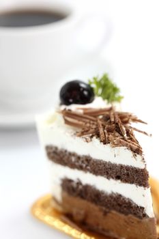 Chocolate Cake with coffee isolated in white background