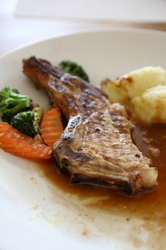 Steak on wood background