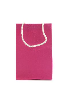 Pink paper bag isolated in white background