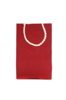 Red paper bag isolated in white background