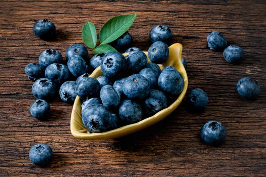  Blueberry fruit on the old wooden floor