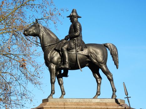 Victorian bronze equestrian monument statue of the Duke of Wellington on his horse Copenhagen stands at Hyde Park Corner London England UK. It was sculpted by Joseph Boehm and was unveiled in 1888 stock photo