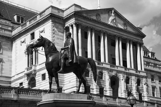 The Bank of England fondly known as The Old Lady Of Threadneadle Street London England UK with an equestrian statue of the Duke of Wellington in the foreground stock photo