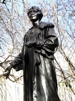 Emily Pankhurst 1858-1928 monument statue in Victoria Tower Gardens at the Houses of Parliament London England UK sculptured by Arthur George Walker and unveiled ion 1930 stock photo