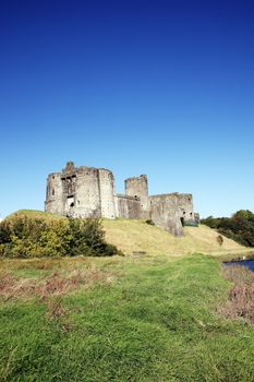 Kidwelly Castle Carmarthenshire Wales UK is a ruin of a 13th century medieval castle and a popular travel destination landmark of the town stock photo