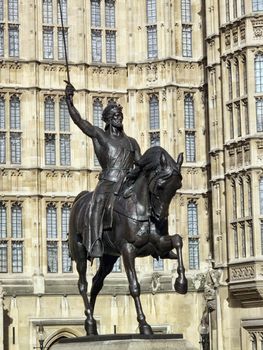 Richard I, (Richard the Lionheart) statue at the Houses Of Parliament in Westminster London, England UK which was created by Baron Carlo Marochetti and completed in 1867 a popular tourist travel destination landmark of the city stock photo