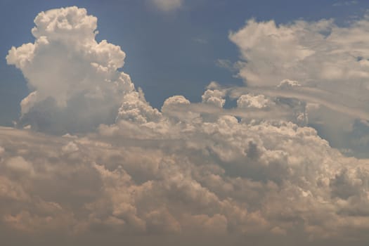The cloudy beautiful sky with the light shining from the sun. The softness of the cloud creates a feeling of relaxation. copy space.