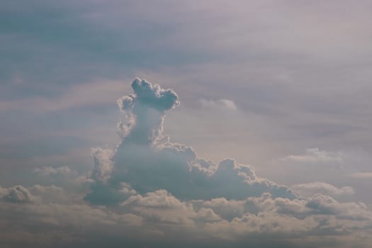 The cloudy beautiful sky with the light shining from the sun. The softness of the cloud creates a feeling of relaxation. copy space.