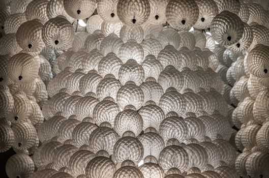 Close-up shot of White gorgeous vintage chandelier decoration.
