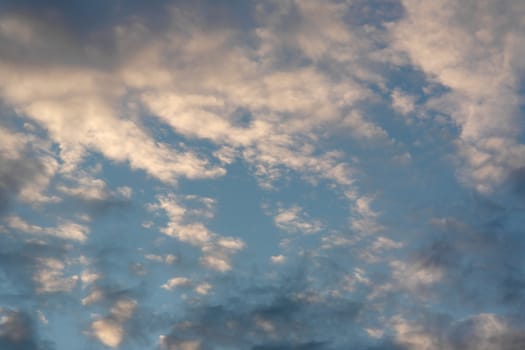 Beautiful eveing sky with clouds, air nature