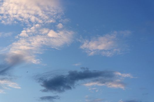 Beautiful eveing sky with clouds, air nature