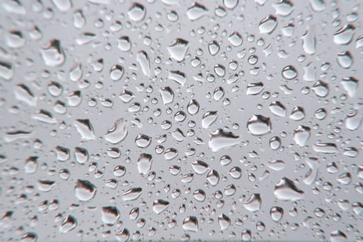 Drops of rain on the window, shallow dof