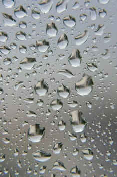 Drops of rain on the window, shallow dof