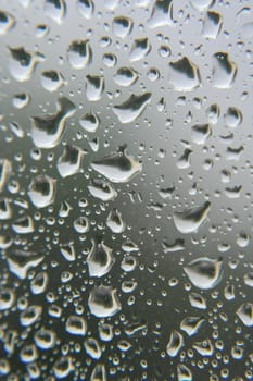 Drops of rain on the window, shallow dof