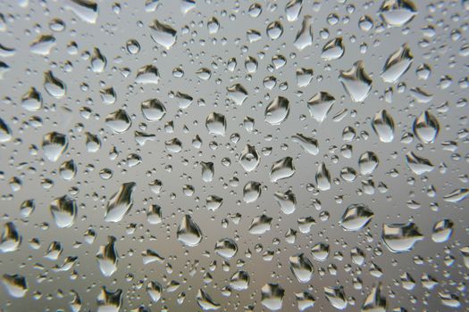 Drops of rain on the window, shallow dof