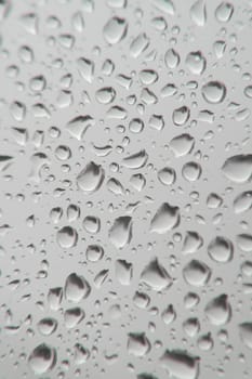 Drops of rain on the window, shallow dof