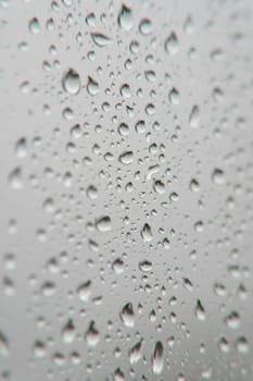 Drops of rain on the window, shallow dof