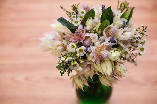 Selective focus of bouquet of flowers in vase