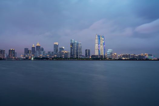 City landscape around the lake. Photo in Suzhou, China.