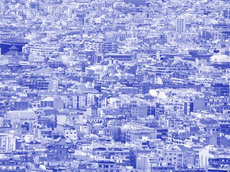 a blue and white futuristic duotone crowded urban cityscape background with hundreds of densely packed buildings