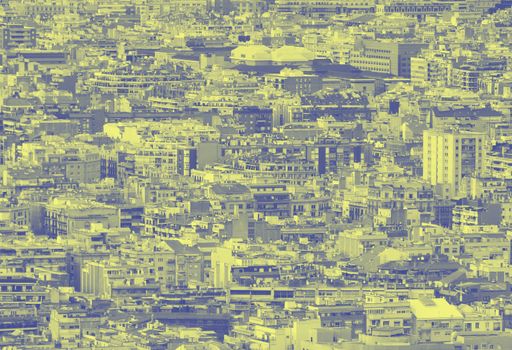 a blue and yellow duotone crowded urban cityscape background with hundreds of densely packed buildings