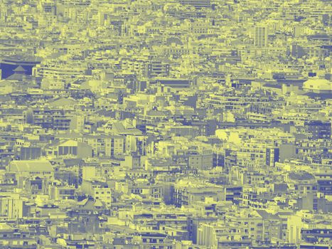 a blue and yellow duotone crowded urban cityscape background with hundreds of densely packed buildings