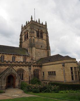 a view of the tower churchyard and main entrance of the cathedral church of saint peter in bradford west yorkshire