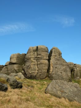 craggy outcrops on the bridestones a group of gritstone rock formations in west yorkshire landscape near todmorden