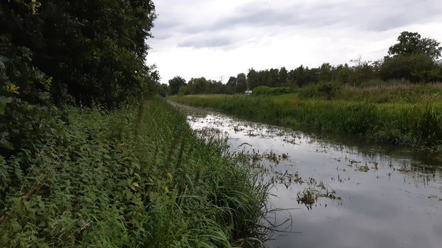 View on Kleine Nete river in Kempen, a region in Belgium. Nature and surrounding landscape.