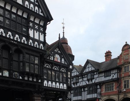 ornate old half timbered gabled buildings in the historic city center of chester