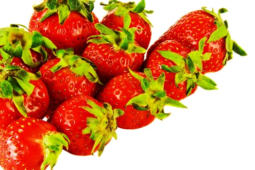 Ripe berries and a large strawberry on a white background

