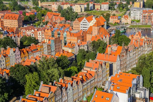Aerial view of old historical town centre with typical colorful houses buildings, tiled roofs, Gdansk, Poland