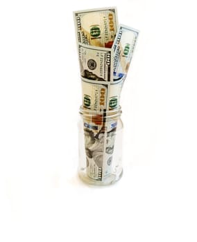 Money banknotes of US dollars inserted into a glass jar like a bouquet

