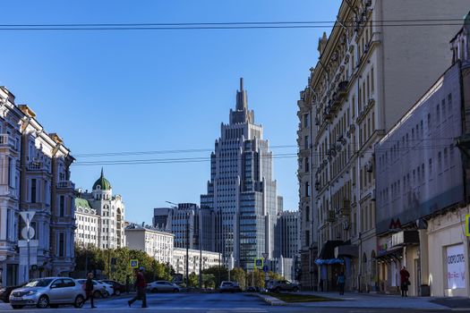 Crossroads to Tverskaya Street. High-rise building of glass and concrete.