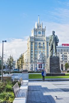 On the pedestal of the monument to the Soviet poet Vladimir Makovsky. In the background is seen the hotel building Beijing (Moscow, Russia).