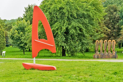 Sculpture of the letter "A" in a city park