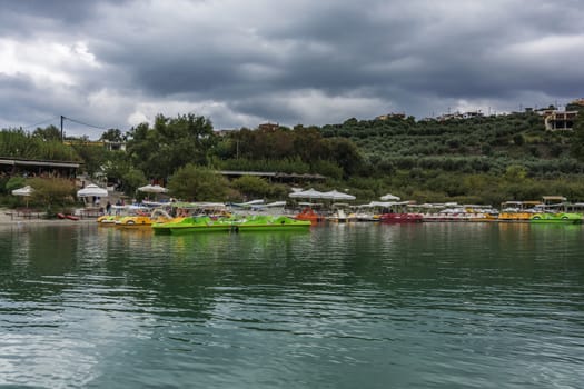 Recreational catamarans moored near the shore