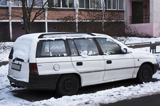 On a white car with snow