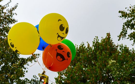 Baby balloons against the sky