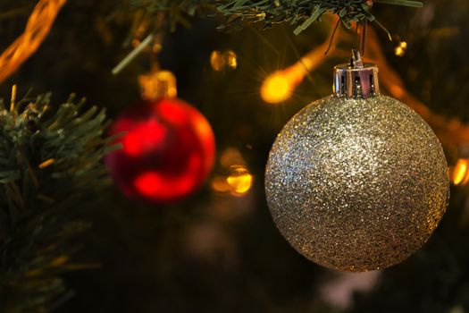 Christmas balls and lights decorate the Christmas tree