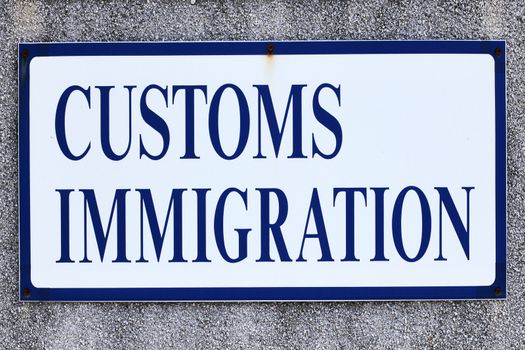 Signpost of a customs and immigration declaration sign at a small airport stock photo