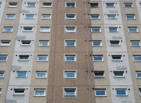 a view of a typical british council built high rise concrete apartment block typical of public housing in the uk