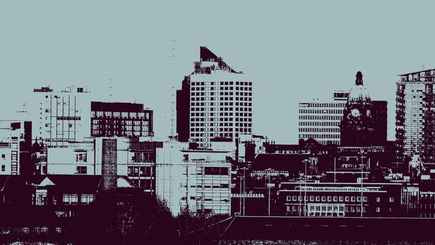 A digitally duotone stylized two color photo cityscape view showing modern buildings and construction cranes