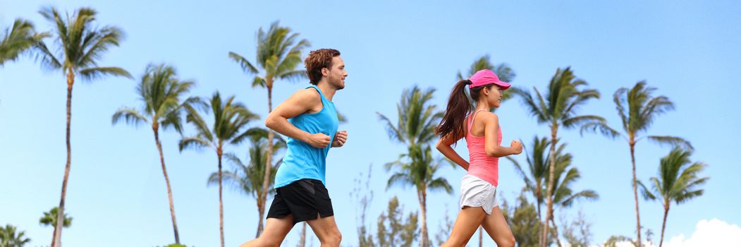 Healthy runners couple running lifestyle banner. Sport fitness people jogging together in summer park outdoors. Horizontal landscape with palm trees background.