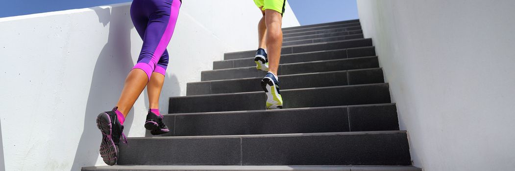 Stairs runners running fitness lifestyle banner. Jogging up staircase training hiit workout. Couple working out legs and cardio. Healthy active sport people exercising in urban city.