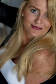 A gorgeous blonde model enjoys a day at home before work